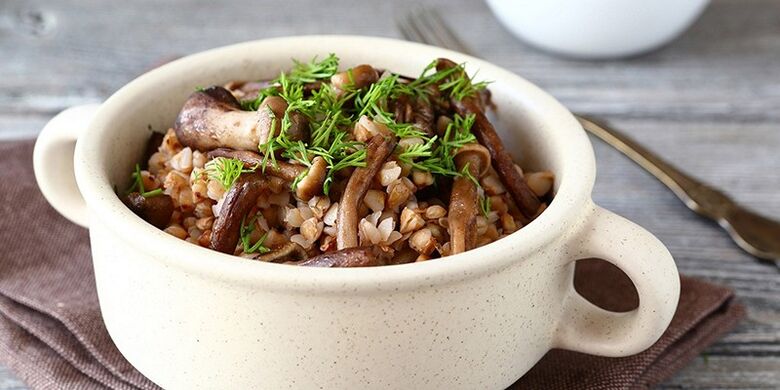 Buckwheat porridge with mushrooms for lunch on the healthy nutrition menu